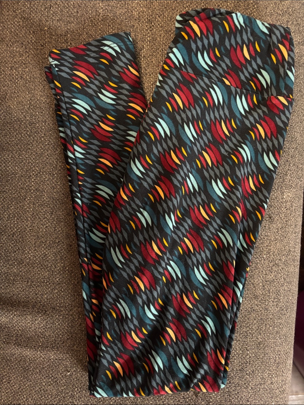 LuLaRoe Kids Black Leggings with Red, Blue, Yellow Feather Motif